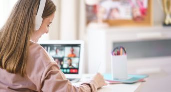 A woman participating in a remote learning session