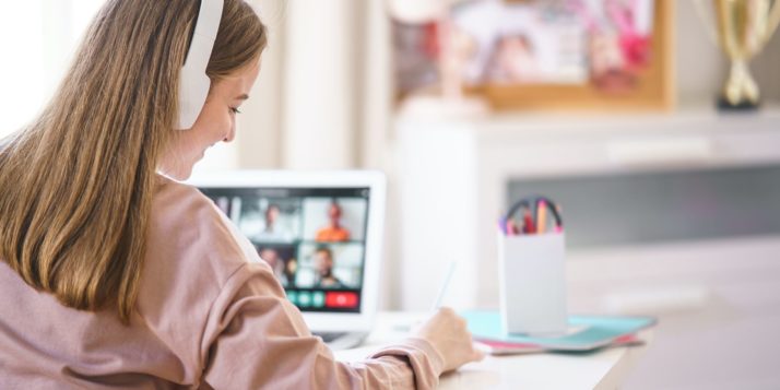 A woman participating in a remote learning session